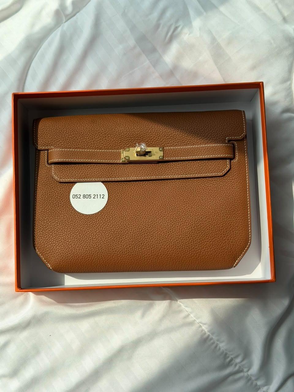 Hermès Kelly Depêches Pouch in Gold