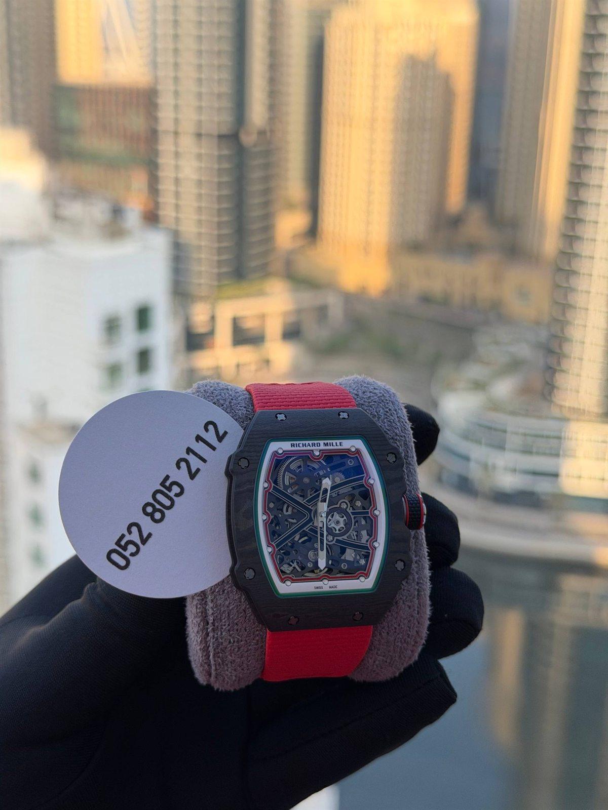 Richard Mille Skeleton Tonneau Watch in Black Carbon & Red