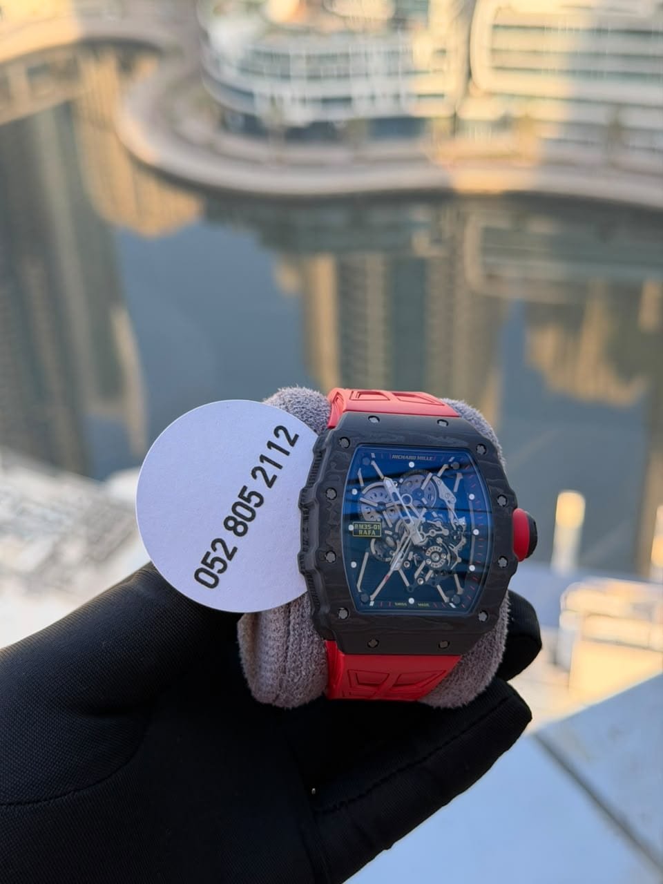 Richard Mille Skeleton Tonneau Watch in Black & Red