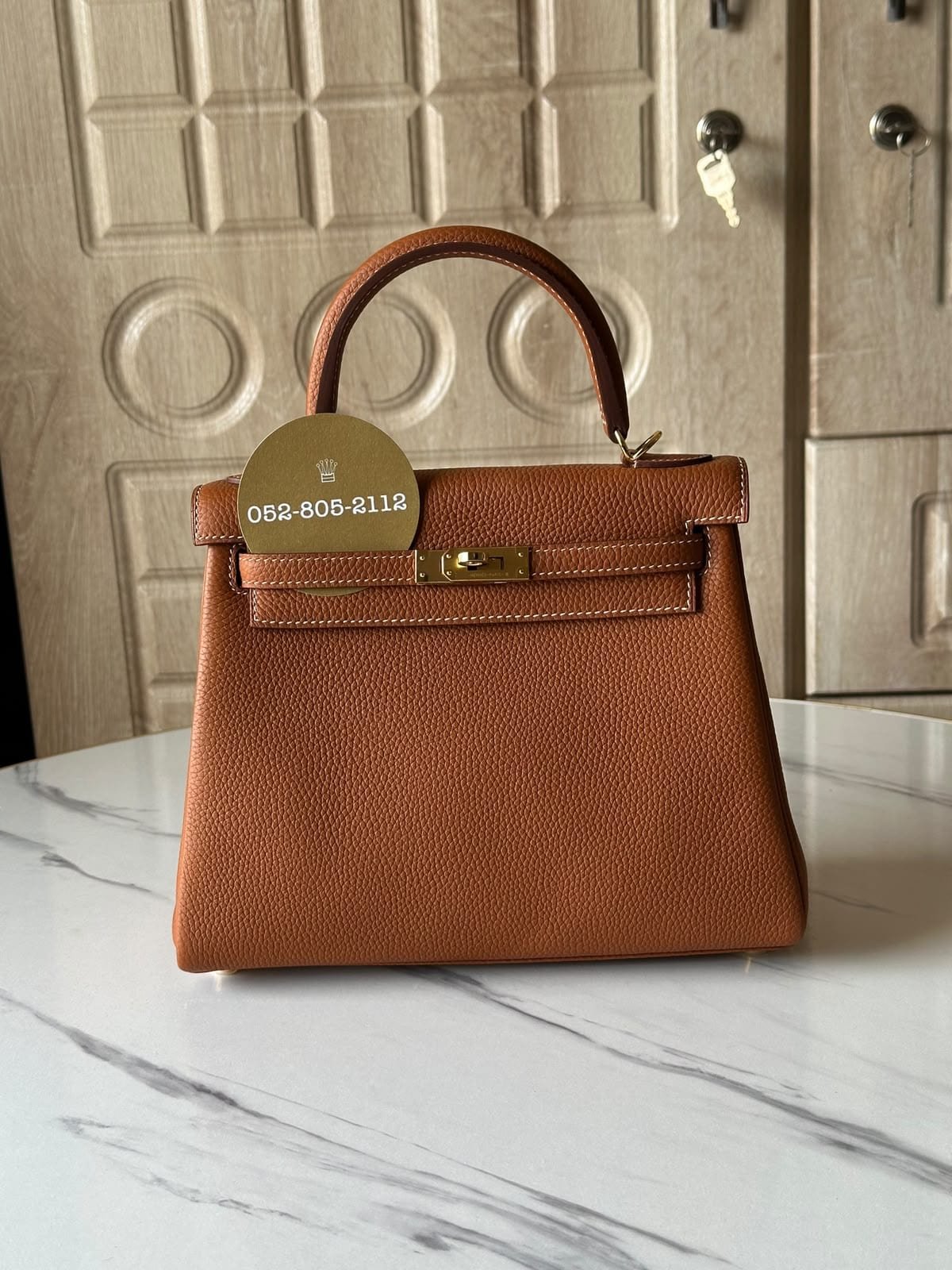Hermès Kelly in gold with gold-tone hardware