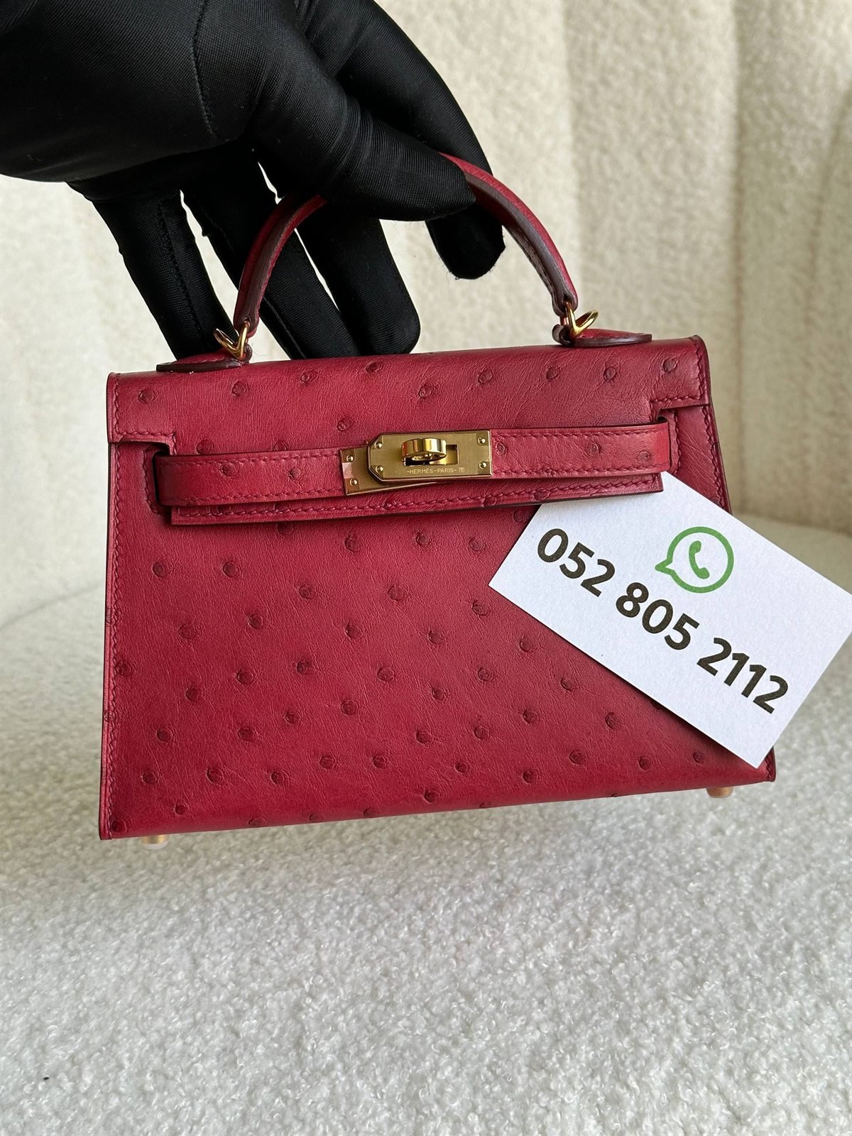 Hermès Kelly Mini in raspberry ostrich