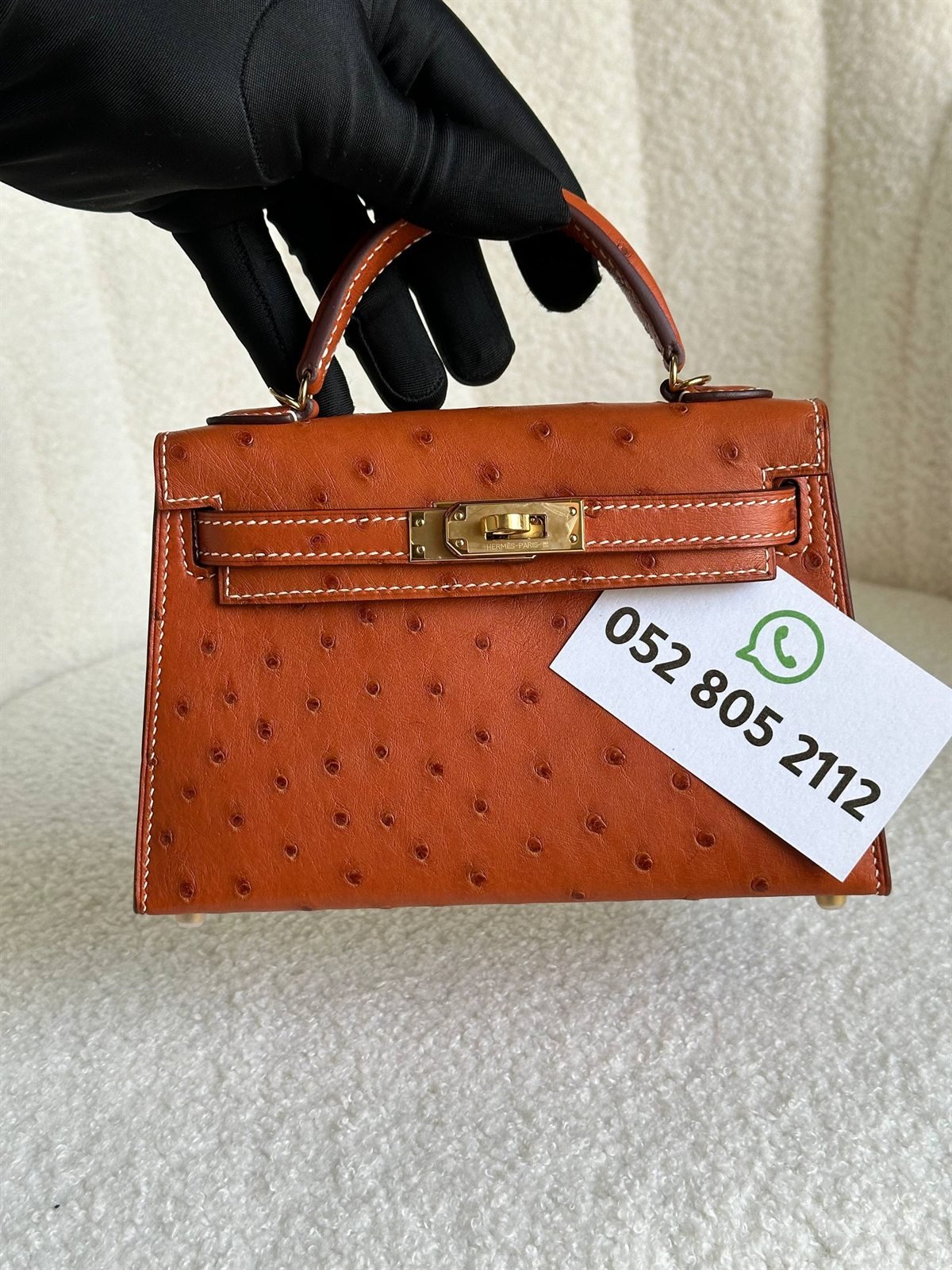 Hermès Kelly Mini in cognac ostrich