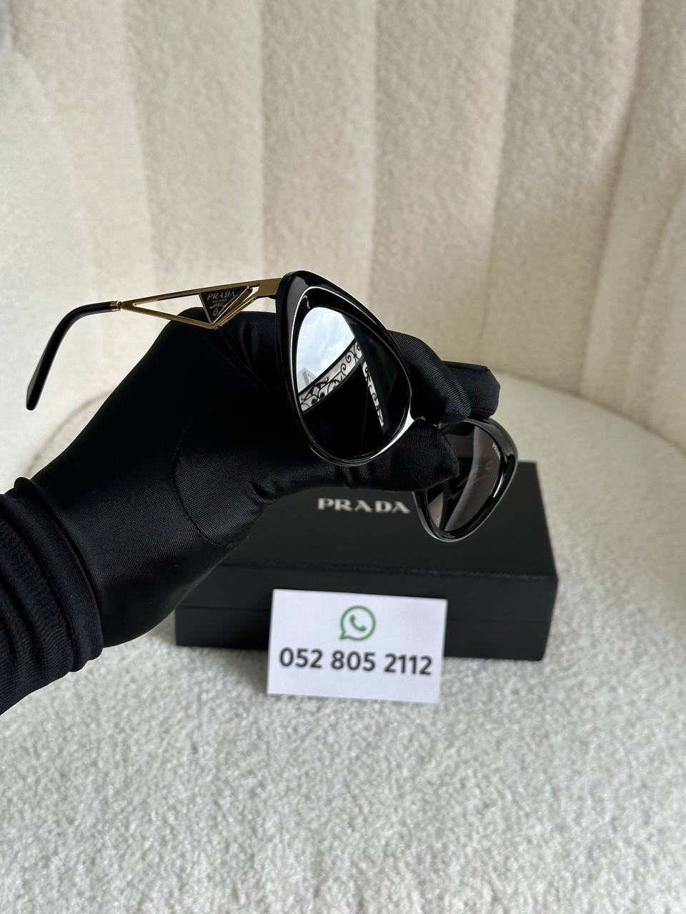 Prada Cat-eye Sunglasses in Black
